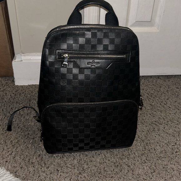 BLACK LV backpack only used once it was and Christmas gift price is negotiable - Picture 4 of 5